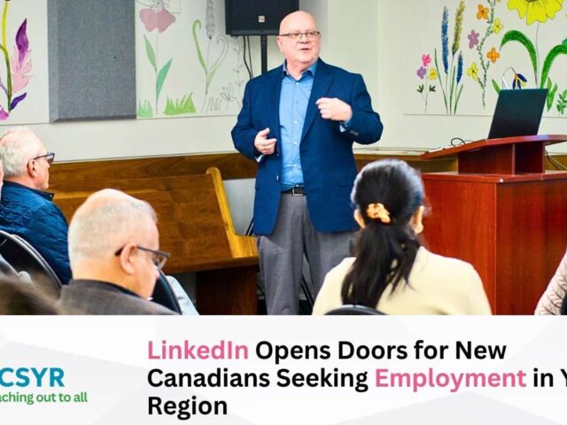 CCSYR staff helping newcomers in York Region navigate LinkedIn for Canadian job market success.